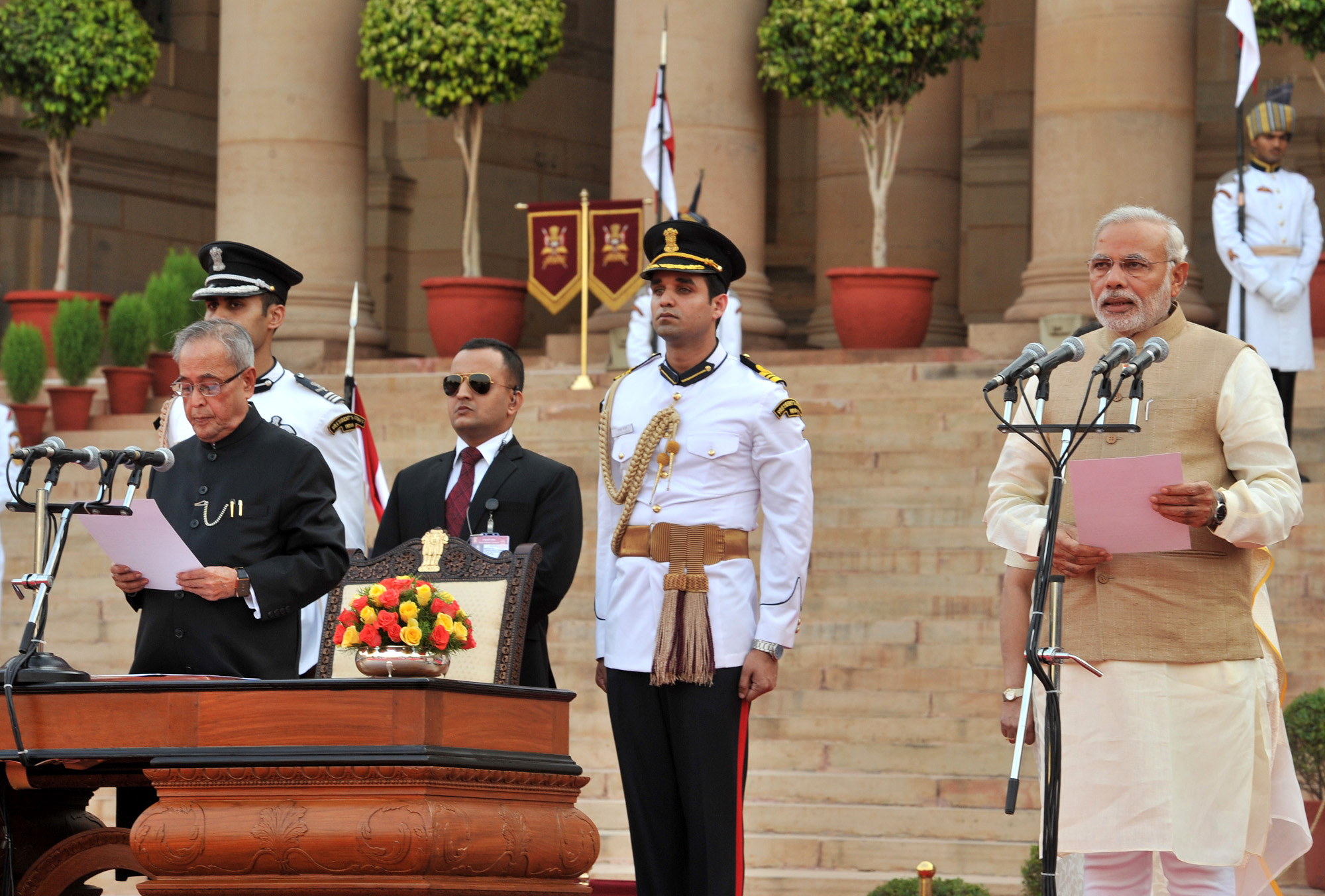 Archive photograph: Narendra Modi takes his first oath as Prime Minister, administered by President Pranab Mukherjee at Rashtrapati Bhavan, 26 May 2014.