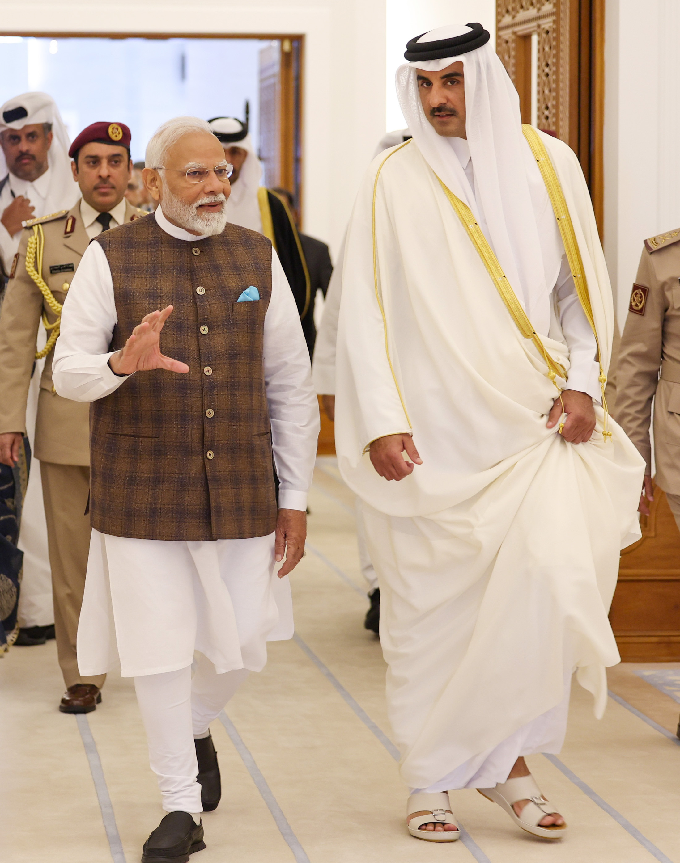 Archive photograph: Modi with Qatar’s Emir Sheikh Tamim bin Hamad Al Thani in Doha, 15 February 2024.